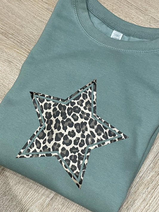 Dusky green sweater with gold leopard print star